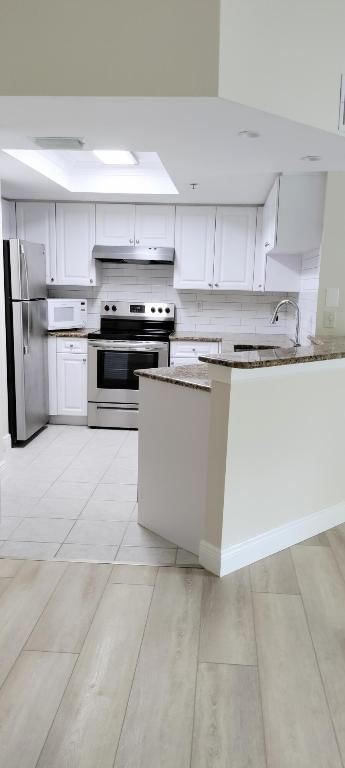 1000 Crestwood Court S #1008, Royal Palm Beach, FL 33411 photo 5