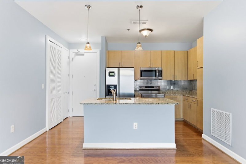 Photo 5 of 711 Cosmopolitan Drive NE #213