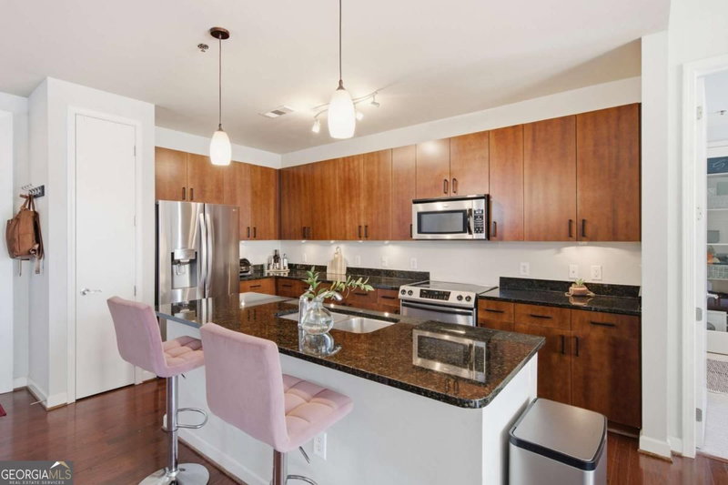 Photo 4 of 711 Cosmopolitan Drive NE #326