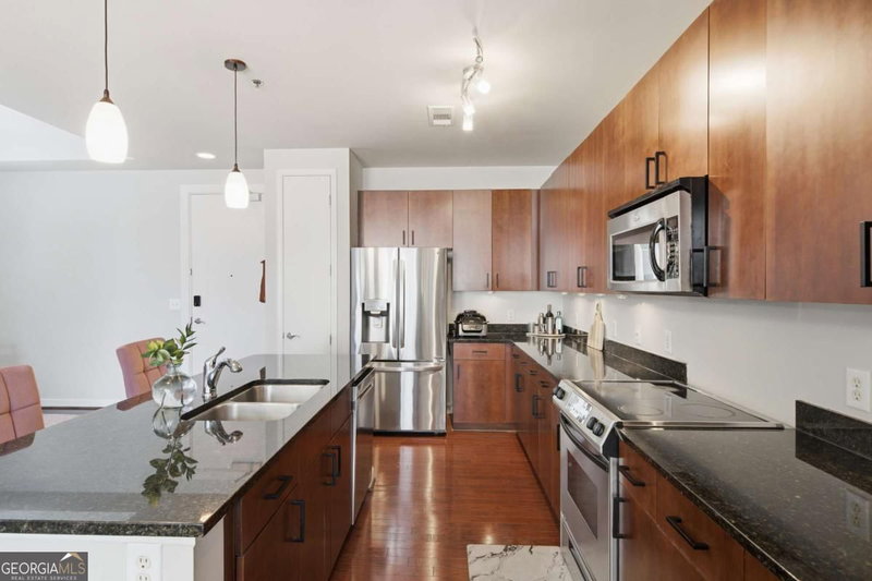 Photo 5 of 711 Cosmopolitan Drive NE #326