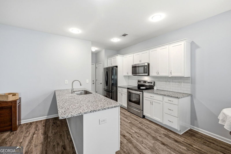 Photo 11 of 6353 Woodland Station Drive