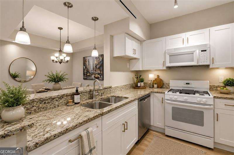 Photo 11 of 240 Renaissance Parkway NE #102