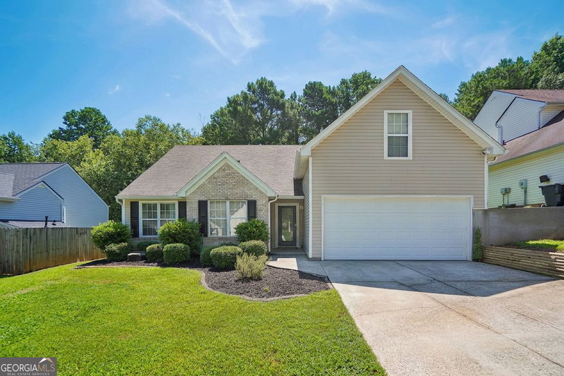 1077 Woodsong Pass Court