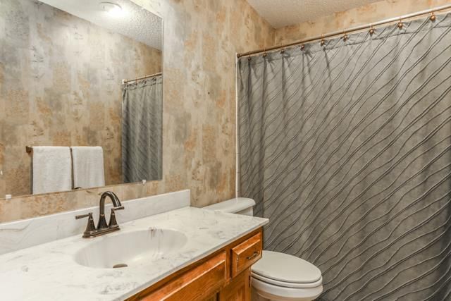 8113 WOODSTONE Street — photo 17