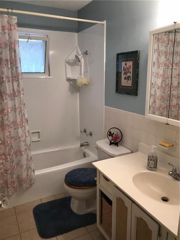 7027 NW Chapel Woods Lane — photo 13