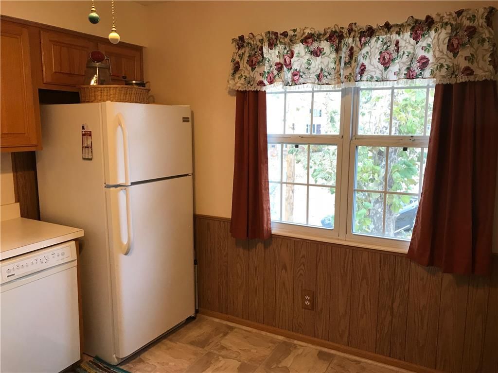 7027 NW Chapel Woods Lane — photo 5
