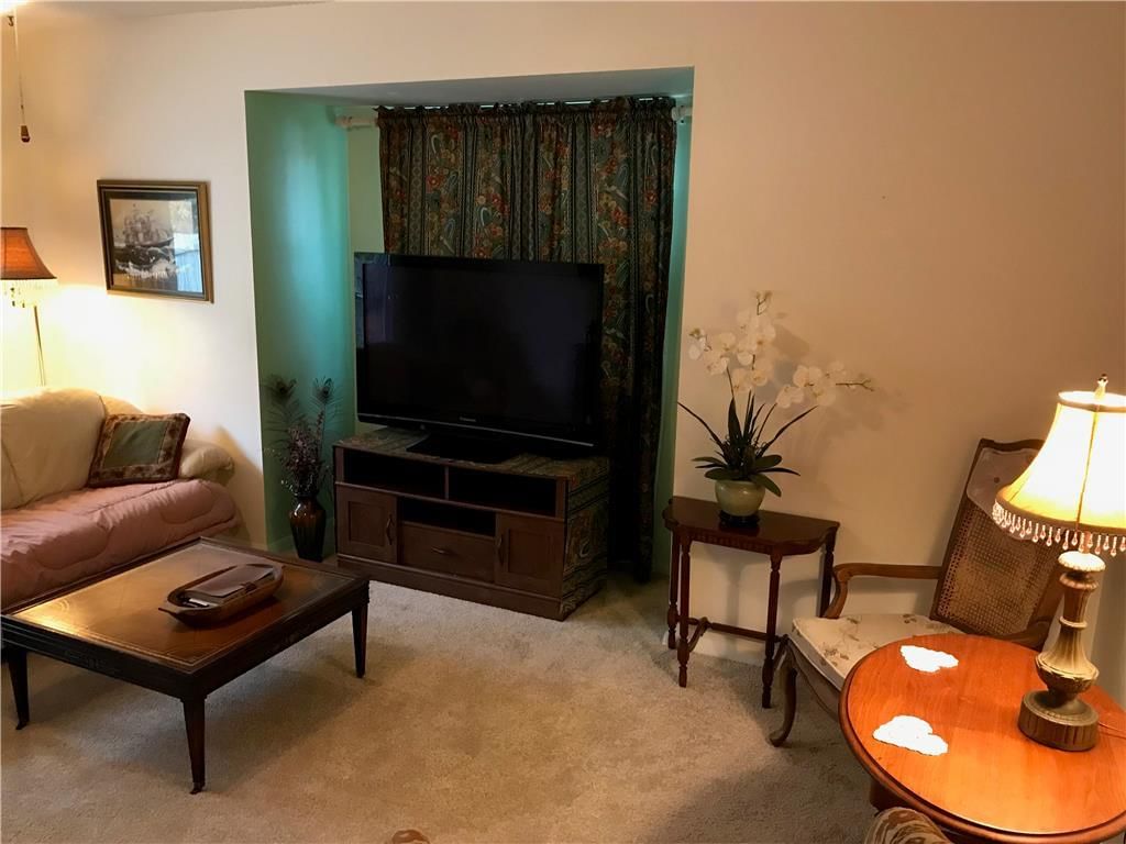 7027 NW Chapel Woods Lane — photo 8