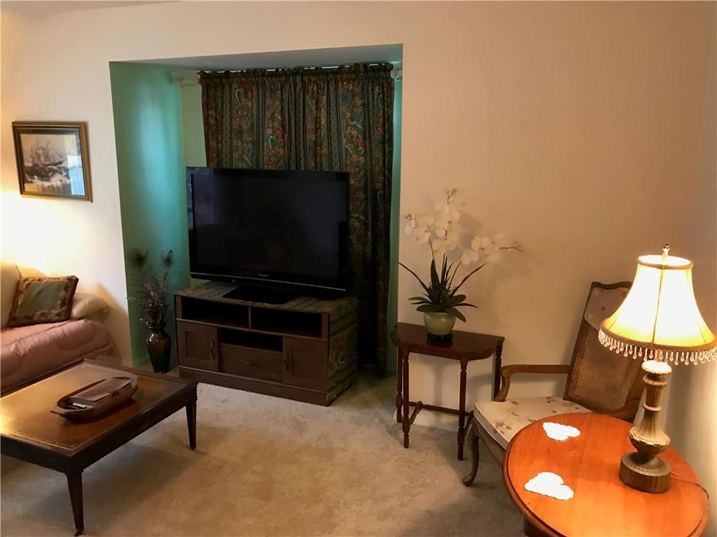 7027 NW Chapel Woods Lane — photo 10