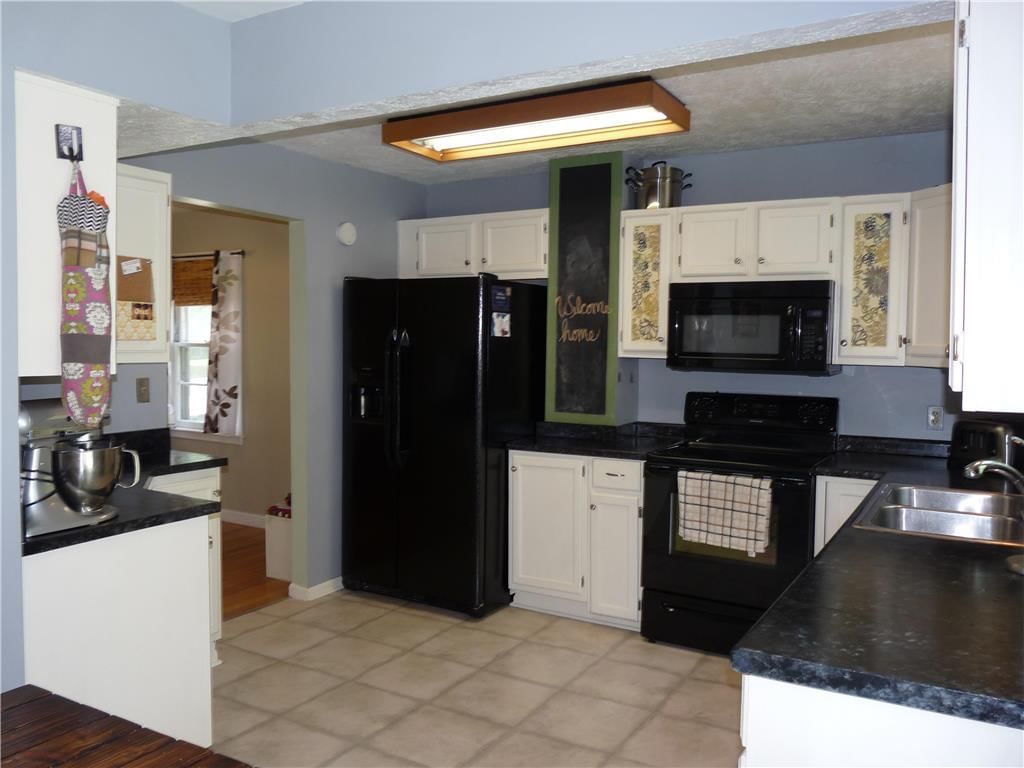12214 W 64th Terrace — photo 8