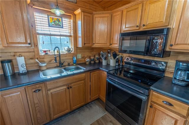 9581 NW Louise Drive — photo 14
