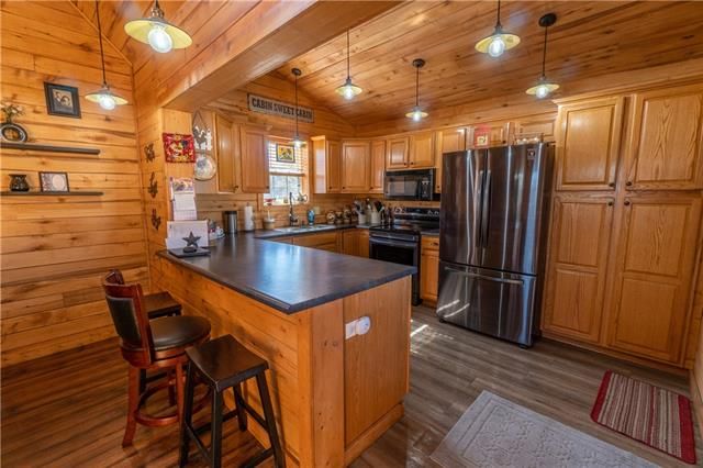 9581 NW Louise Drive — photo 16