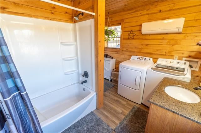9581 NW Louise Drive — photo 28
