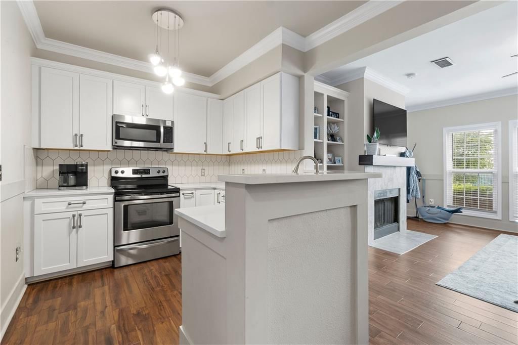 11613 Tomahawk Creek #G Parkway — photo 7