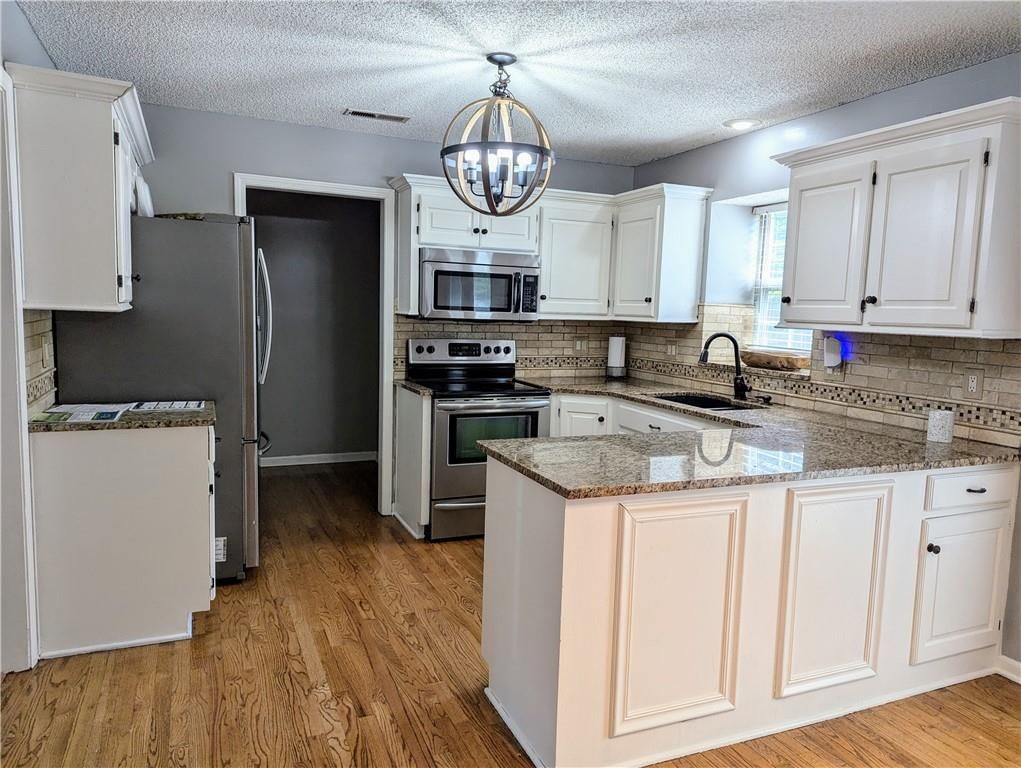 812 NW Rosaceae Drive — photo 16