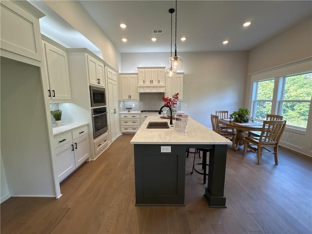 12720 NW BITTERSWEET Drive — photo 4