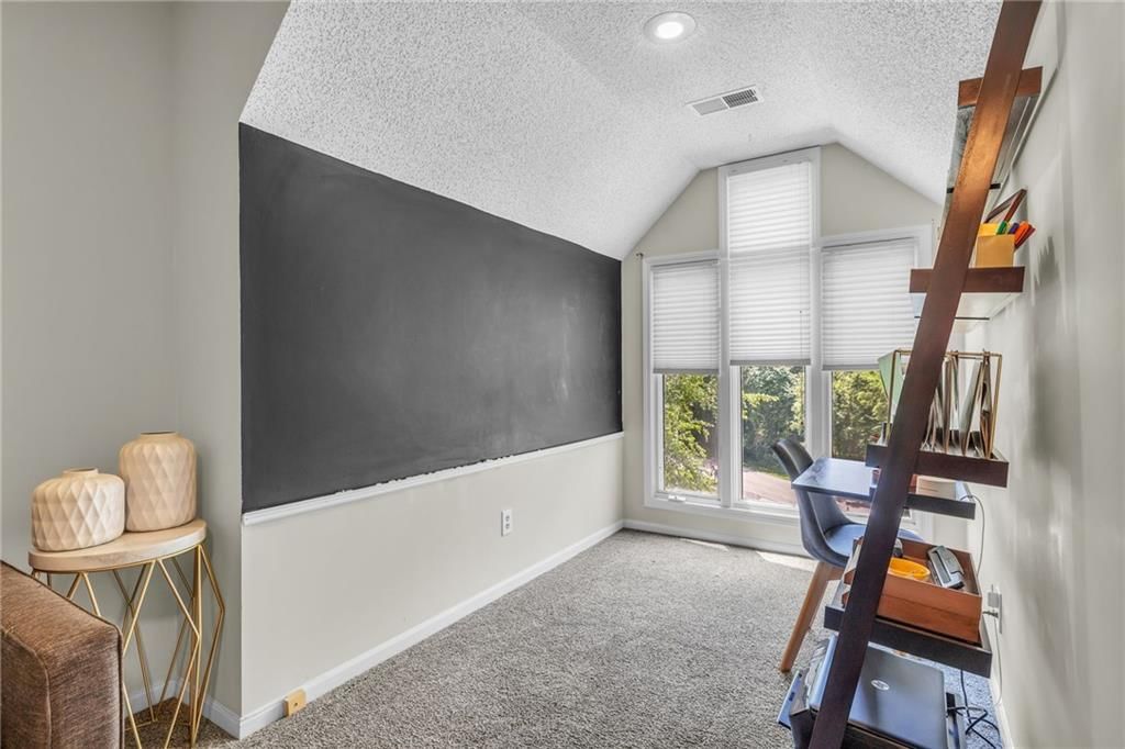 8233 NW Weatherby Drive — photo 25
