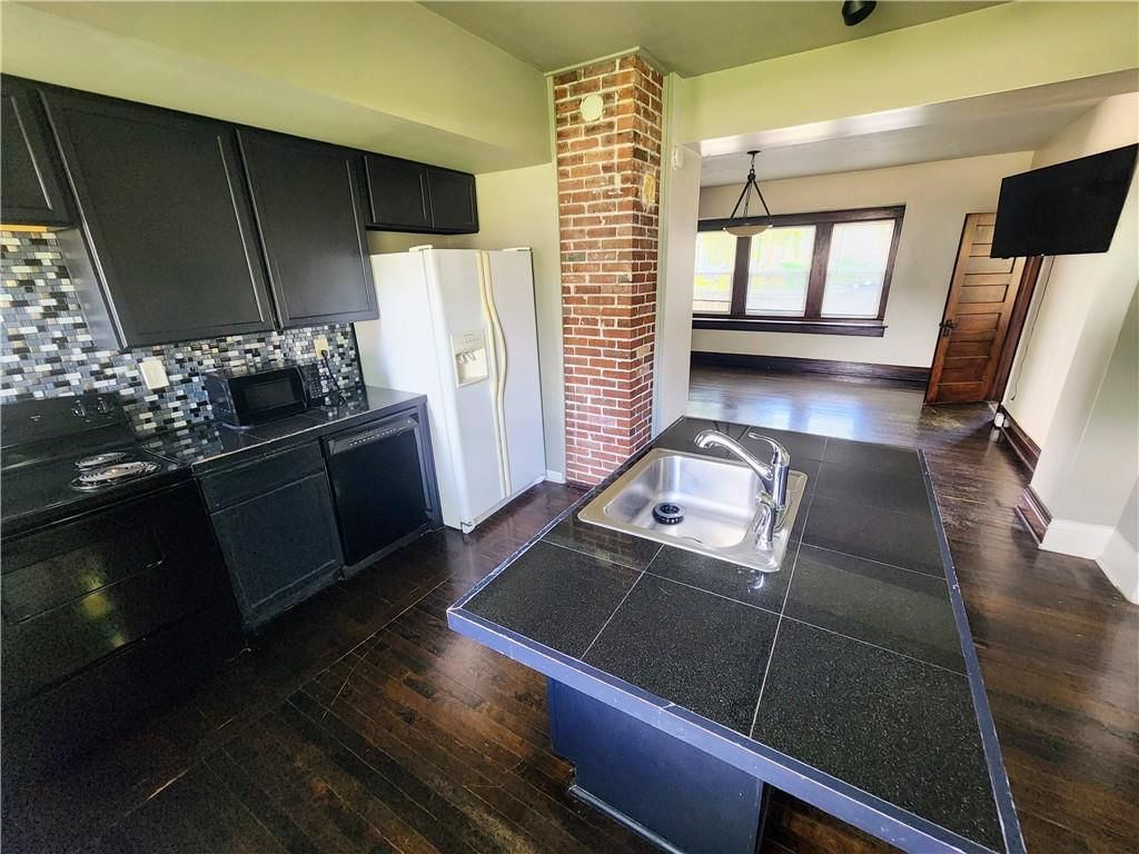 306 W 39TH Terrace — photo 10
