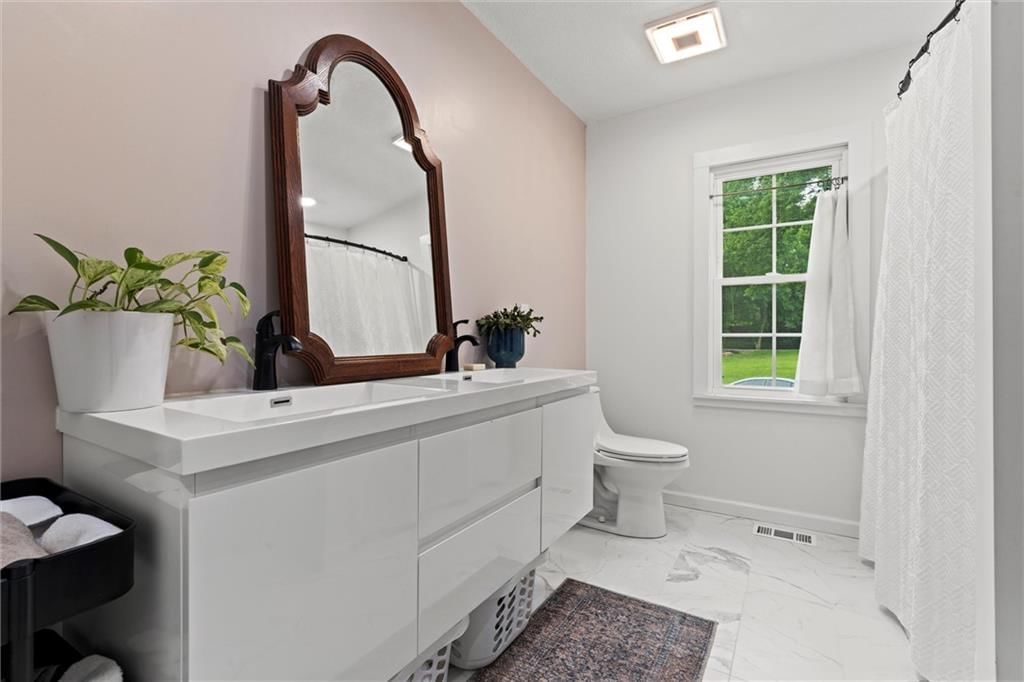 7502 James A Reed Road — photo 20