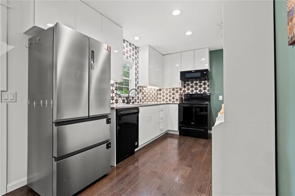 7502 James A Reed Road — photo 3