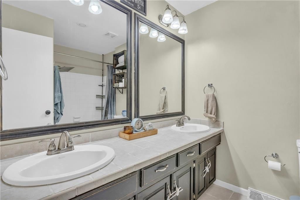 5501 NW Clubhouse Cove — photo 12