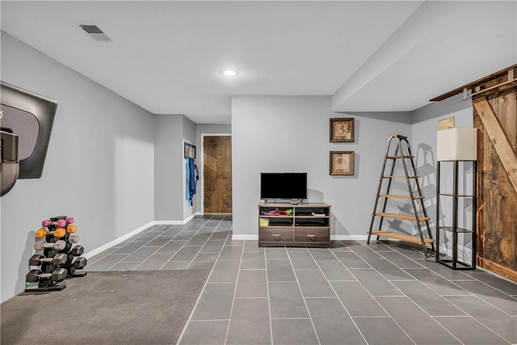 5501 NW Clubhouse Cove — photo 14