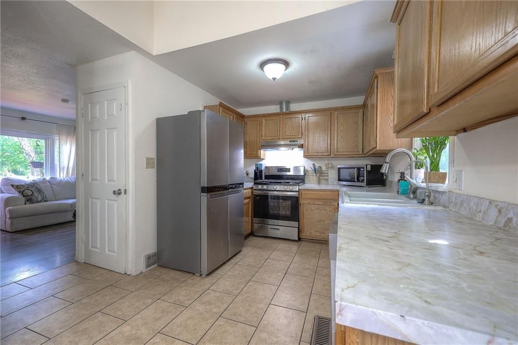 5635 WEBSTER Avenue — photo 11