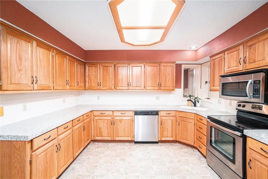 6523 NW Revere Drive — photo 17