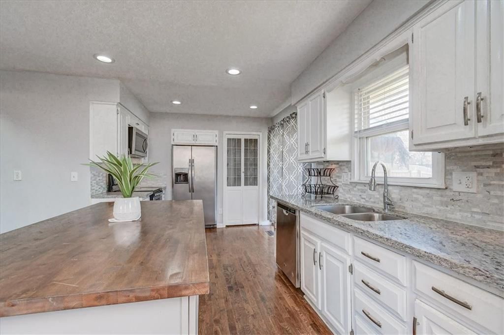 802 NE Fairway Homes Court — photo 14