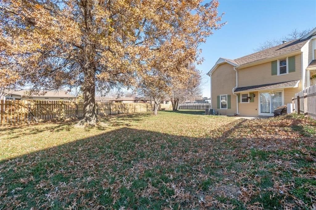 802 NE Fairway Homes Court — photo 32