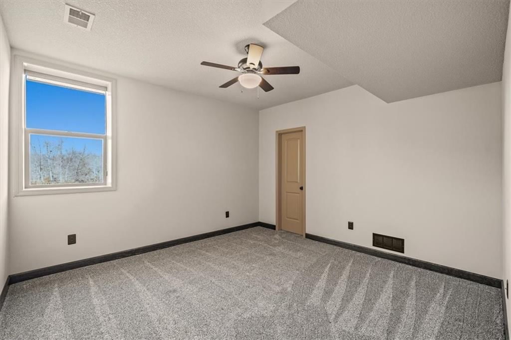 12344 S Dunraven Street — photo 28