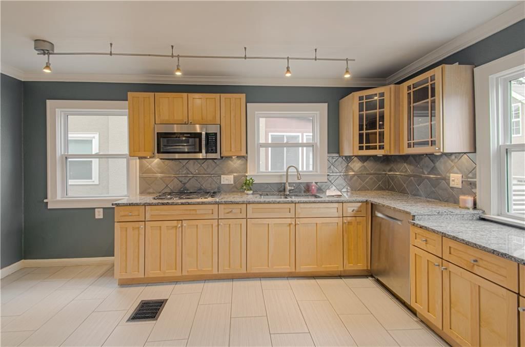 1012 W 71st Terrace — photo 16