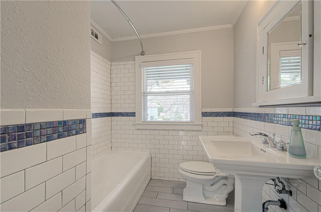 1012 W 71st Terrace — photo 28