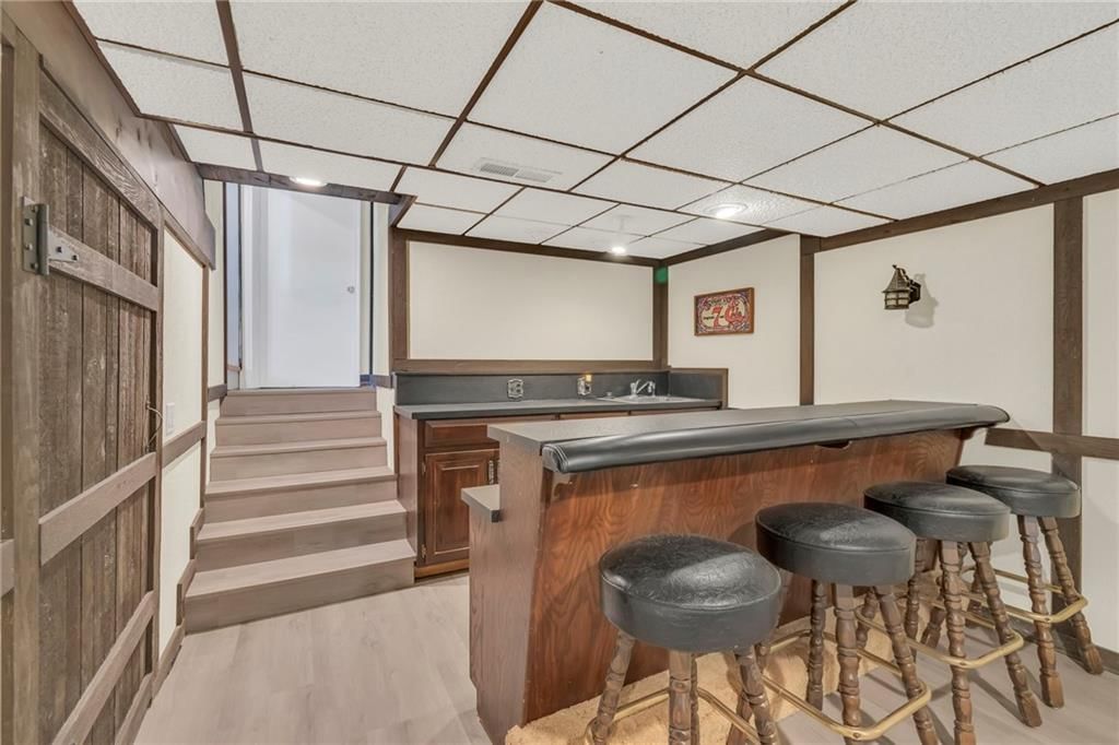8106 NW Twin Oaks Drive — photo 28