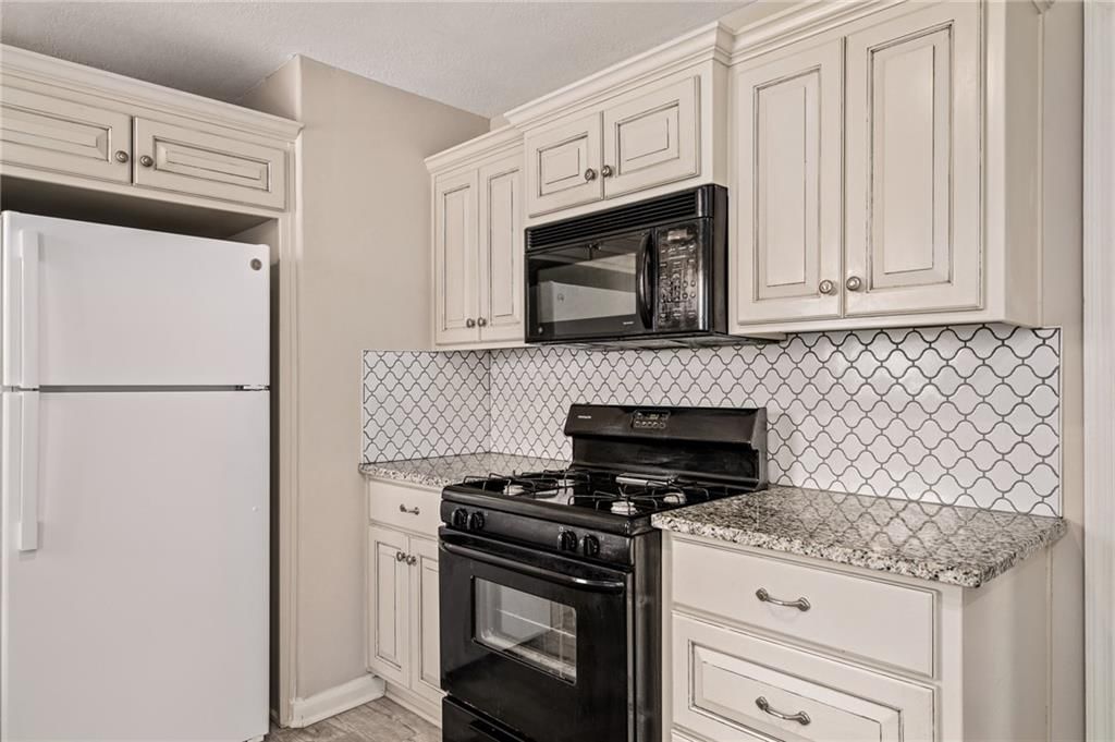11406 W 68TH Place — photo 8
