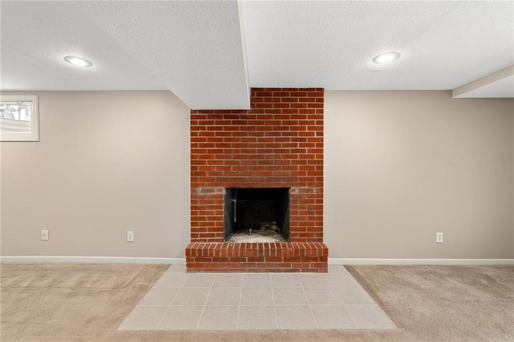 7167 NW CHAPEL WOODS Circle — photo 18