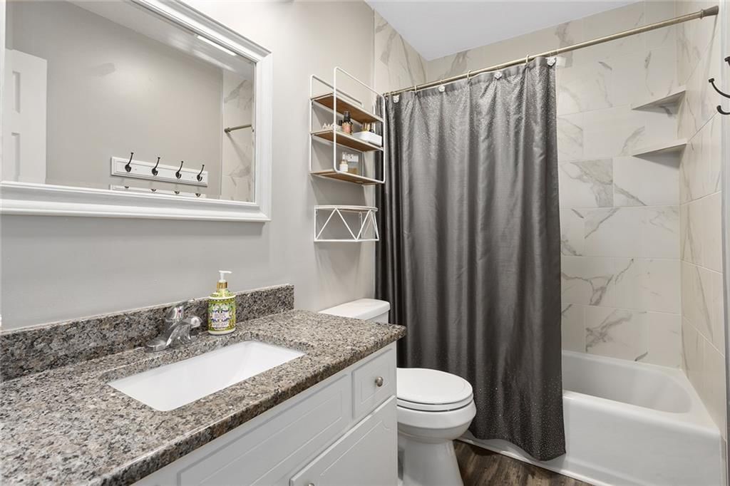 6952 NW Chapel Woods Lane — photo 16