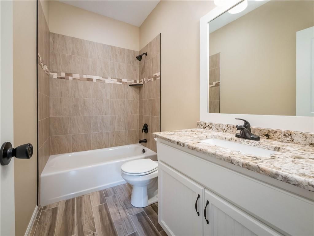 1302 NE White Oaks Lane — photo 13