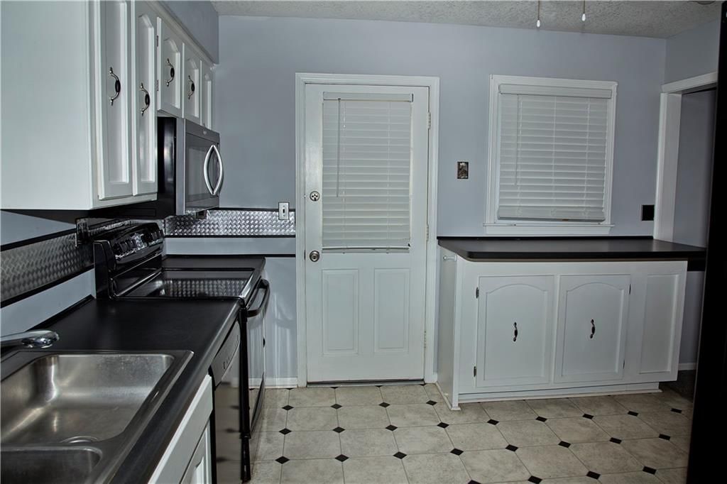 7111 NW Edgehill Road — photo 21