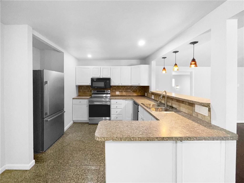 9018 E 74th Terrace — photo 15