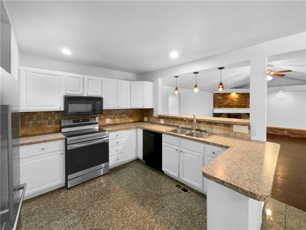 9018 E 74th Terrace — photo 6