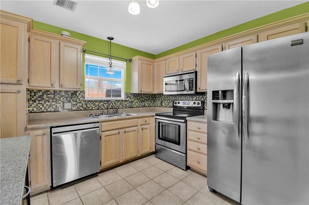 5724 NW Plantation Lane — photo 10