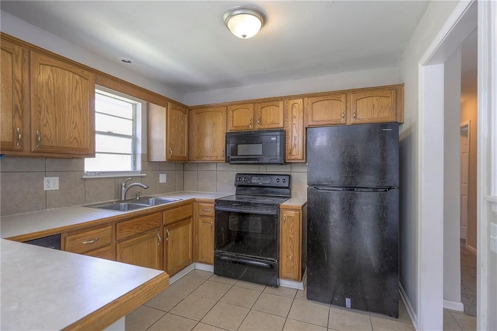 7504 E 119TH Terrace — photo 8