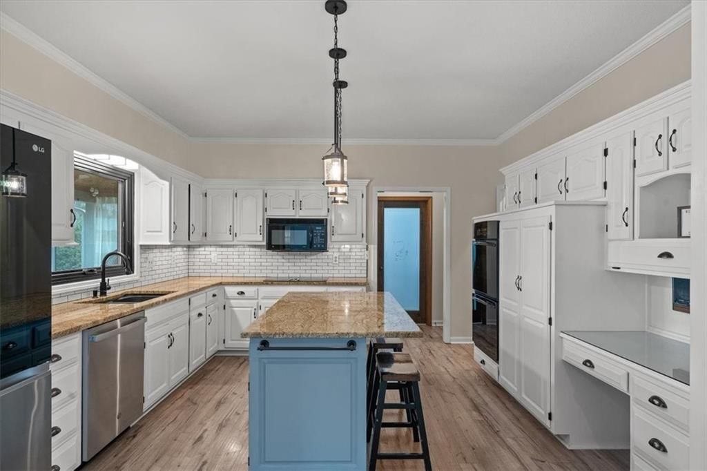 2553 NW Bent Tree Circle — photo 8