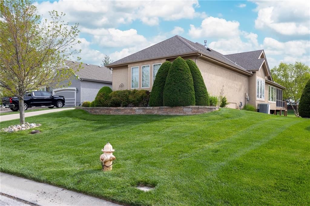 1649 NE Woodland Shores Circle — photo 2