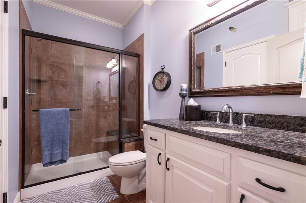 1649 NE Woodland Shores Circle — photo 33