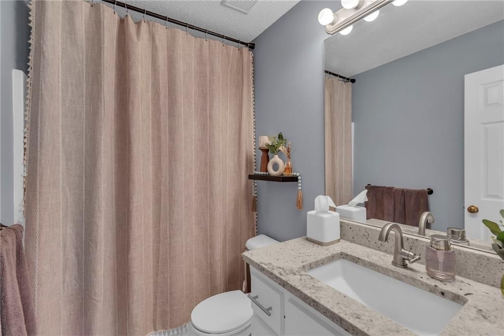 213 NE Chateau Drive — photo 20