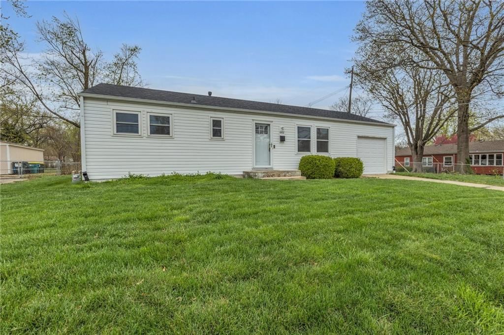 6102 QUIVIRA Road — photo 2