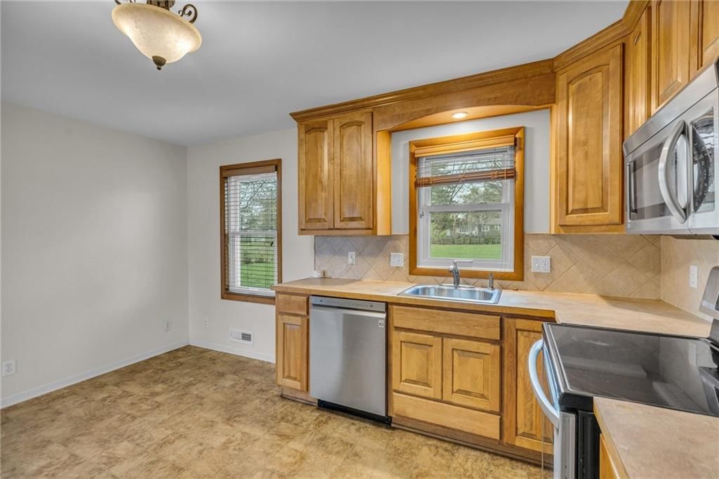 6102 QUIVIRA Road — photo 12