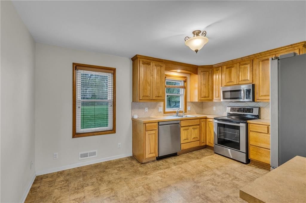 6102 QUIVIRA Road — photo 8