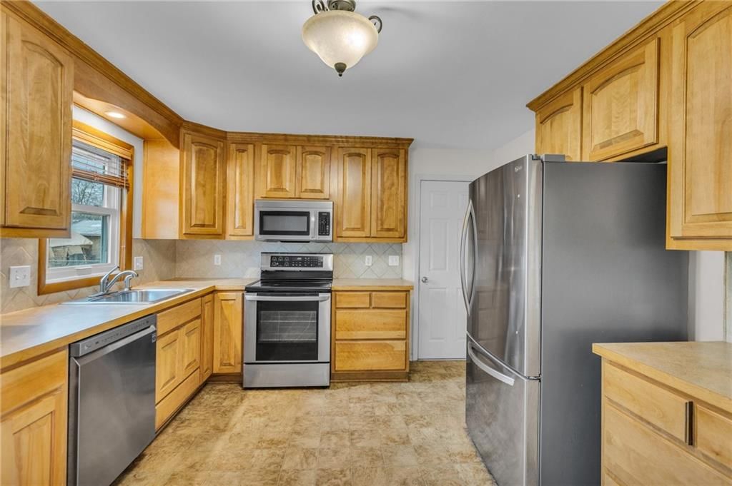 6102 QUIVIRA Road — photo 10
